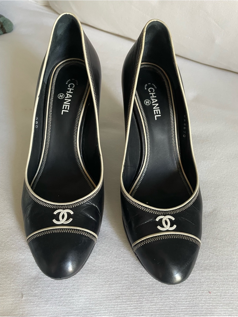 CHANEL Black Leather Cap-Toe Pumps with Cream Piping and CC Logo 222.00 only